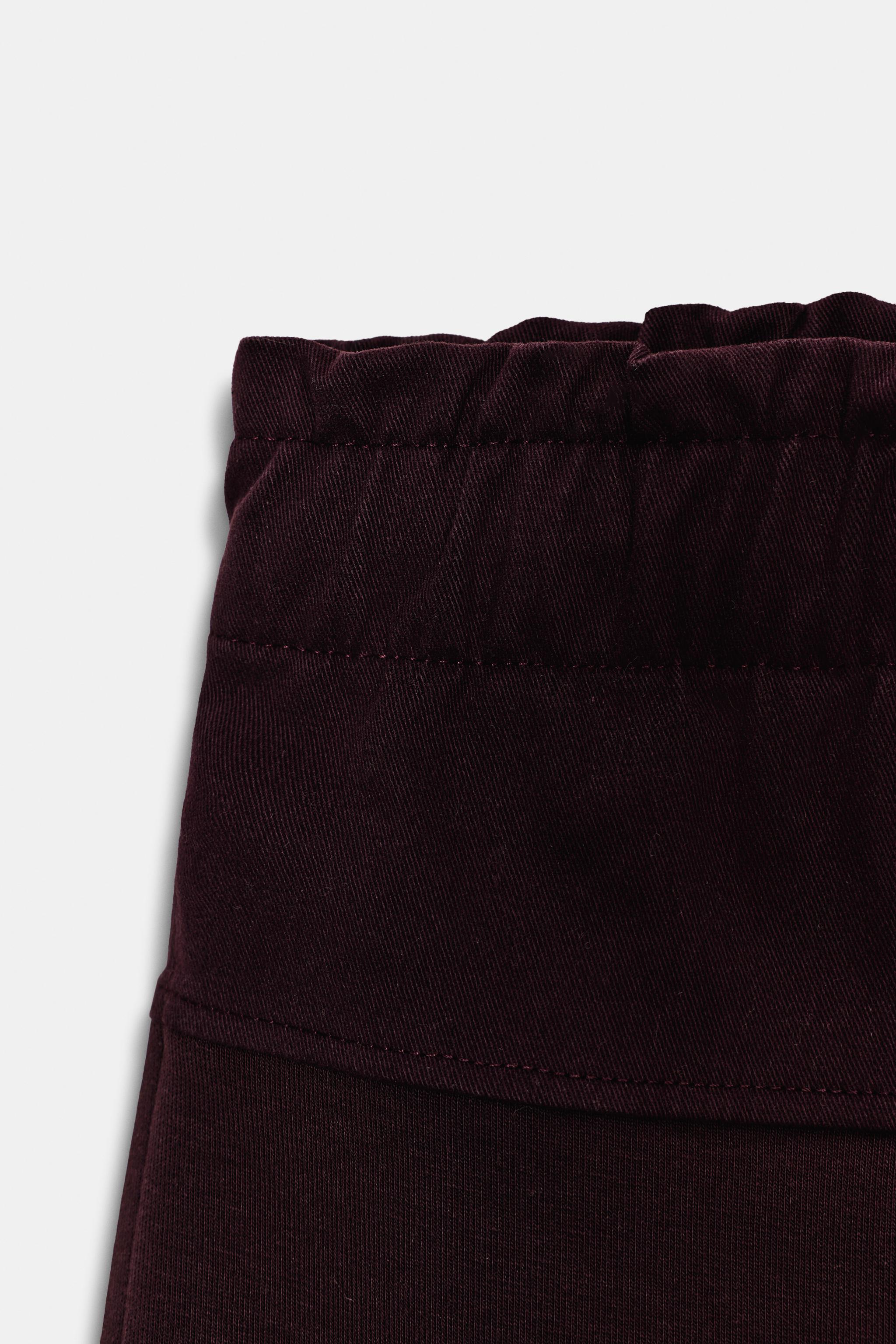 CONTRASTING FABRIC PANTS